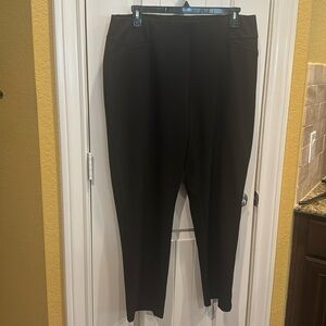 Black pull on pant with faux pockets on front and smooth back.